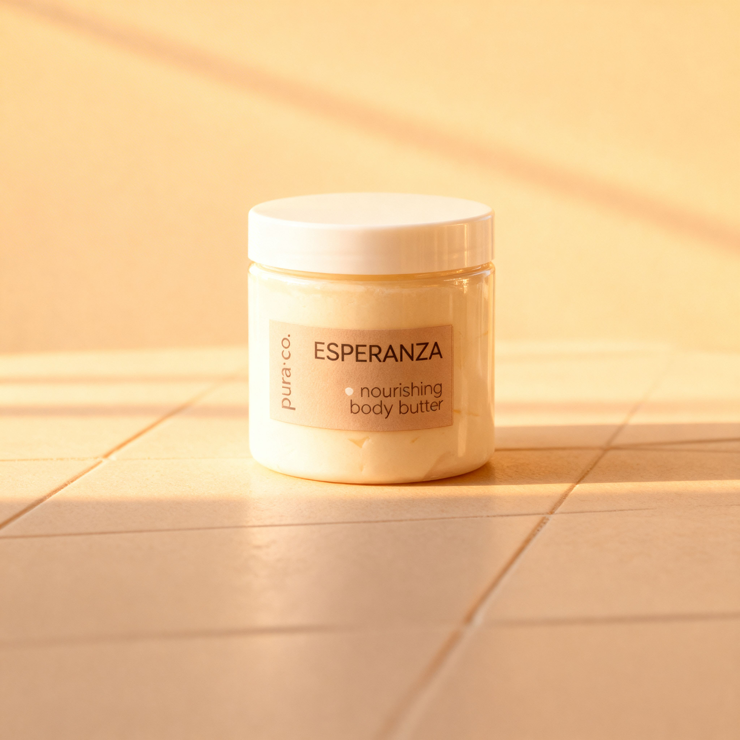 Pura+Co | The body butter jar is shown on a tiled surface |  White Tea and Eucalyptus Scent | Handmade Skin Care | Puerto Rico