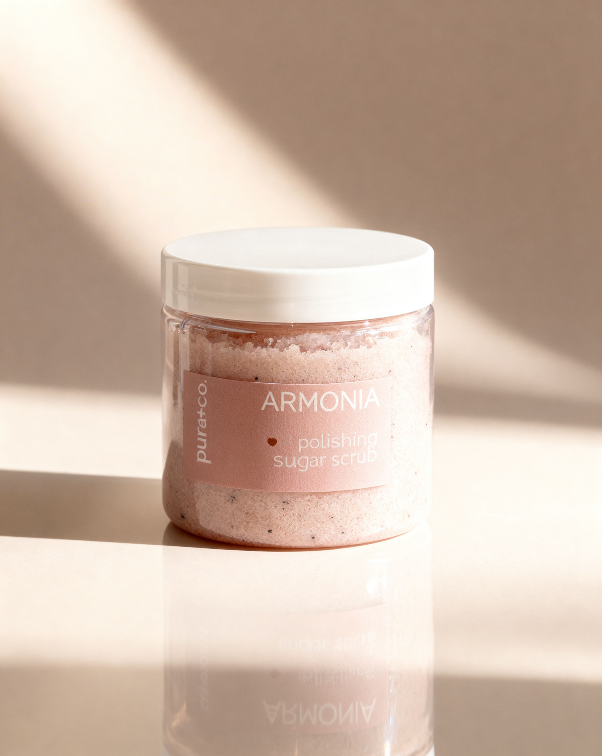 Pura+Co | the Armonia Sugar Scrub jar sits on a solid surface | Exfoliante Natural |  Grapefruit Mints Scent | Handmade Skin Care | Puerto Rico