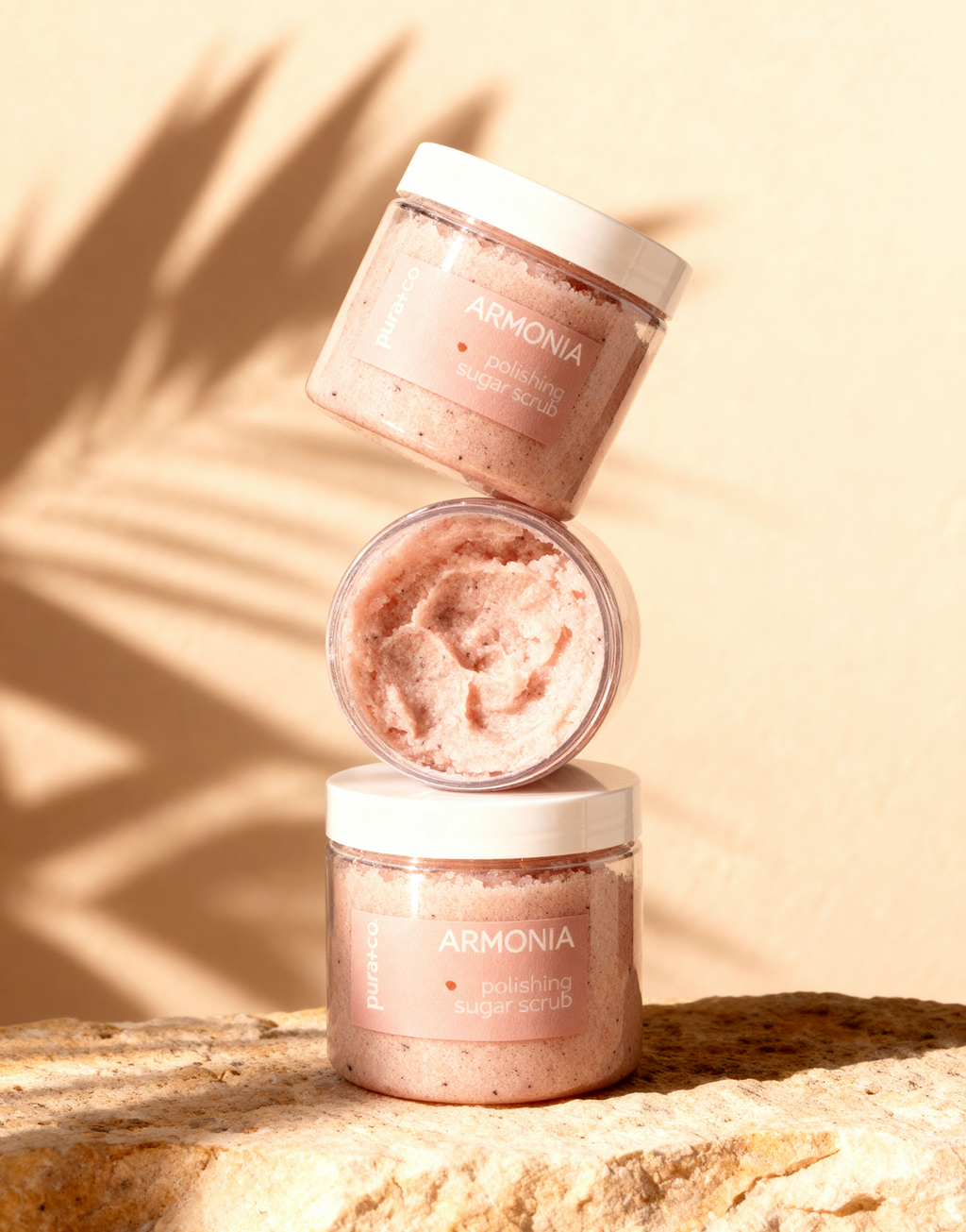 Pura+Co | A column of three Armonia Sugar Scrubs sits on top of each other on a reflective surface | Exfoliante Natural |  Grapefruit Mint Scent | Handmade Skin Care | Puerto Rico