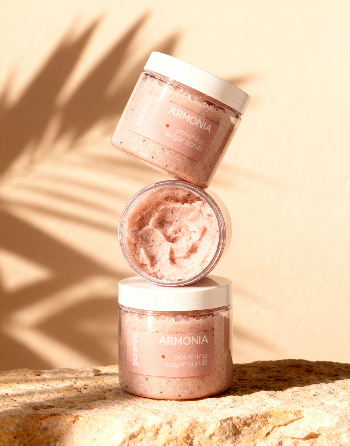 Pura+Co | A column of three Armonia Sugar Scrubs sits on top of each other on a reflective surface | Exfoliante Natural |  Grapefruit Mint Scent | Handmade Skin Care | Puerto Rico