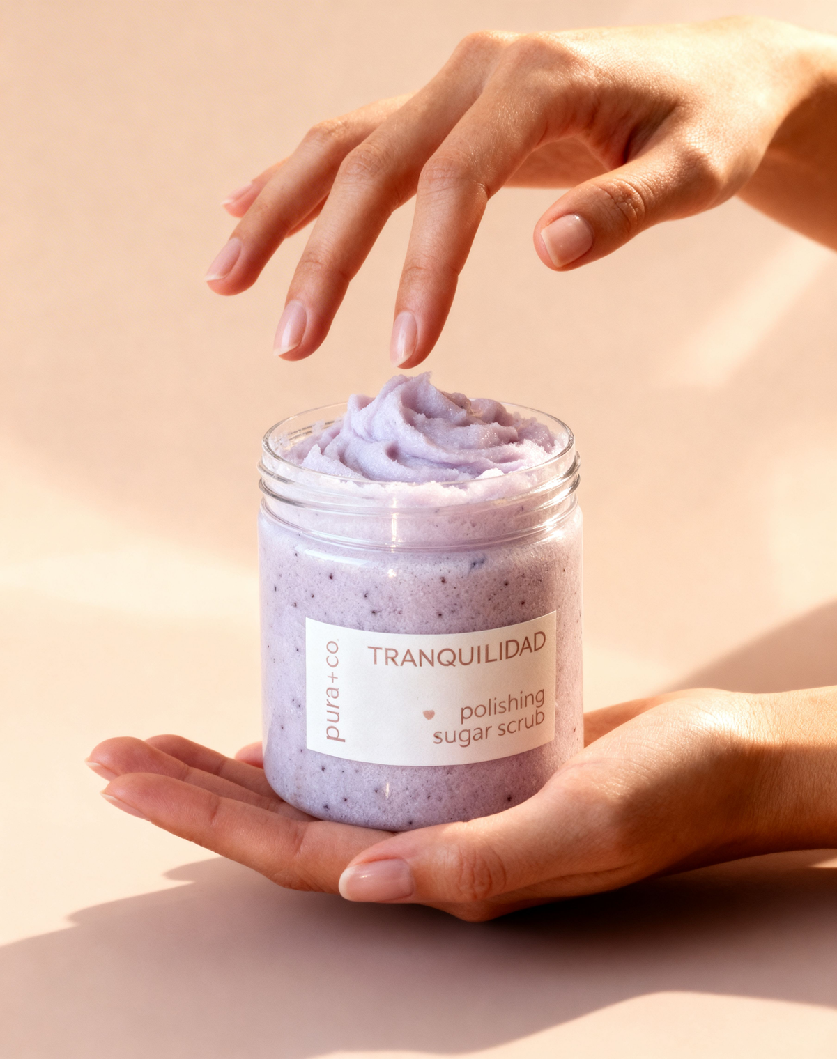 Pura+Co | Hands reach in the Tranquilidad Sugar Scrub jar | Exfoliante Natural |  Lavender Vanilla Scent | Handmade Skin Care | Puerto Rico